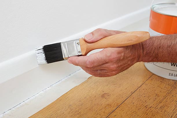 how to use paint brush to paint the wall